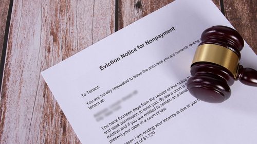 Eviction Notice for Nonpayment document with a wooden judge gavel