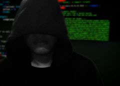 silhouette of person with hoodie on