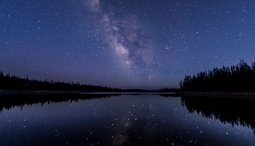 night sky reflecting on a lake