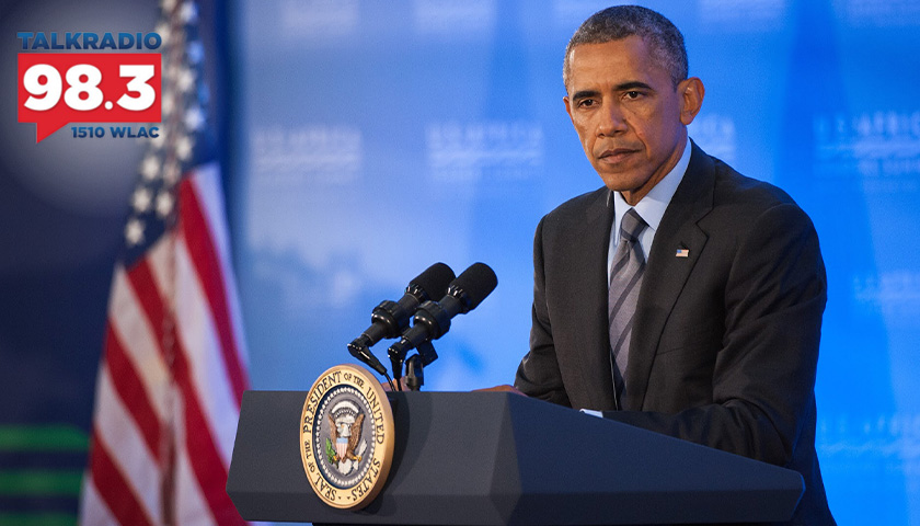 Barack Obama standing at a podium