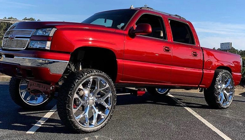 squated red truck