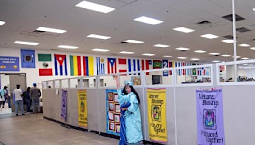Casa Alitas display flags from immigrants' home countries