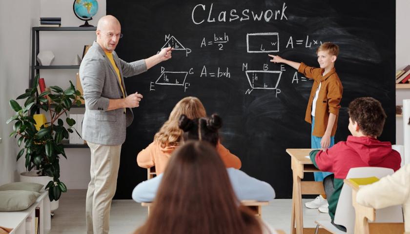 Teacher instructing students in classroom