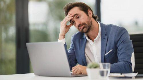 Overwhelmed businessman