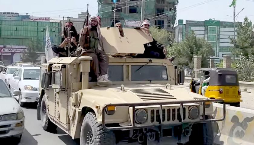 Taliban riding on Humvee in Kabul