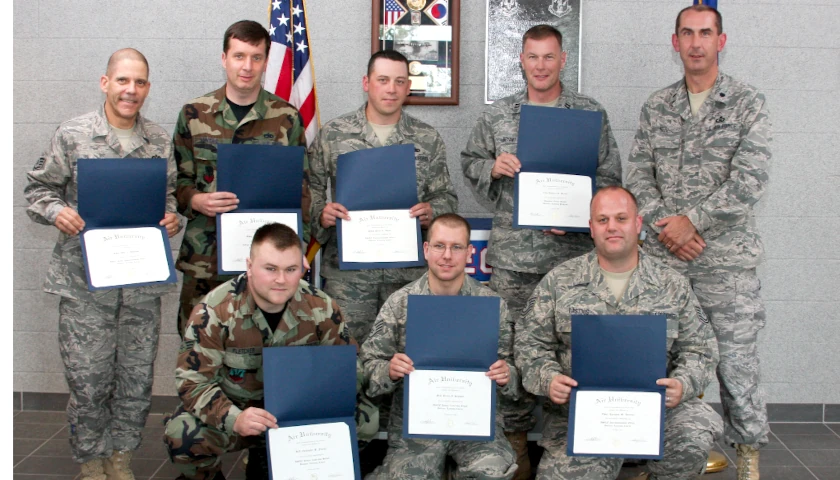 Members of the military receiving diplomas