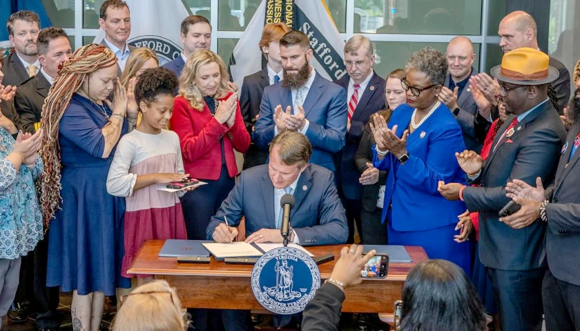 Gov. Glenn Youngkin signs a bill