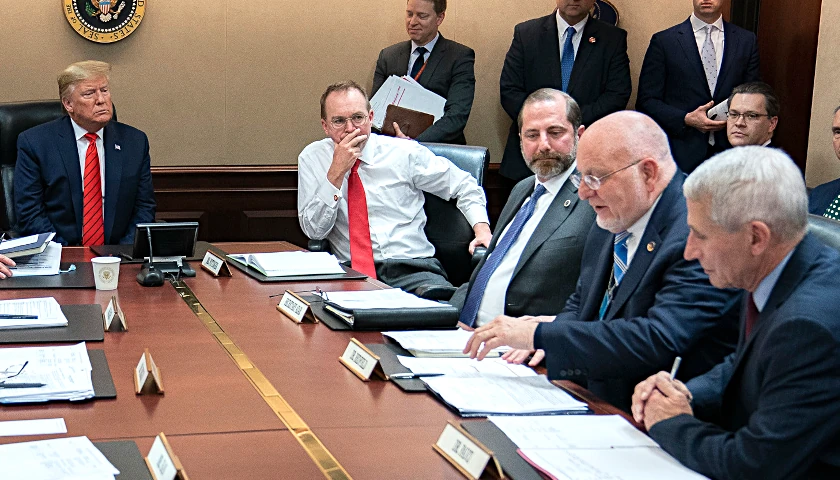 Dr. Robert Redfield addresses a presidential briefing with Trump, Fauci, Mick Mulvaney, and others
