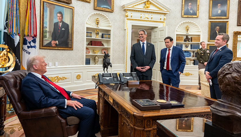 President Donald Trump with Scott Bessant, Marco Rubio, and Mike Waltz
