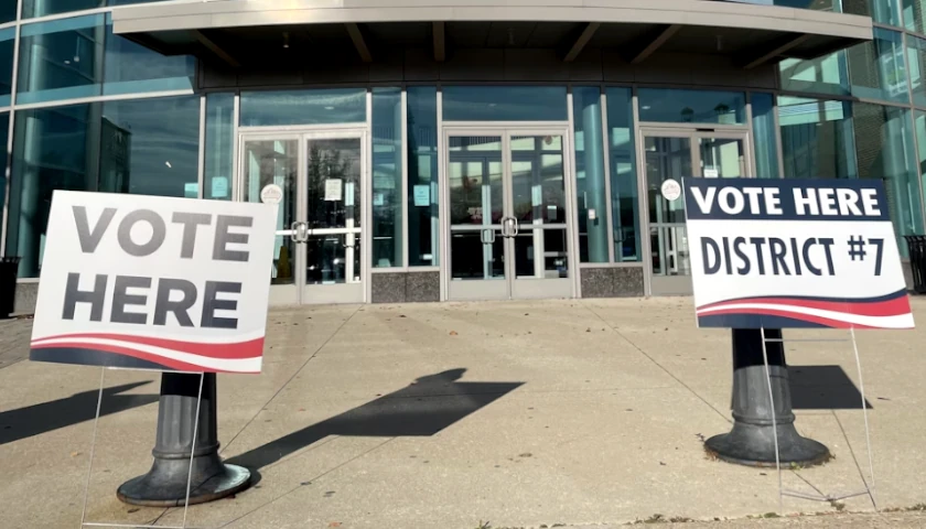Vote here sign