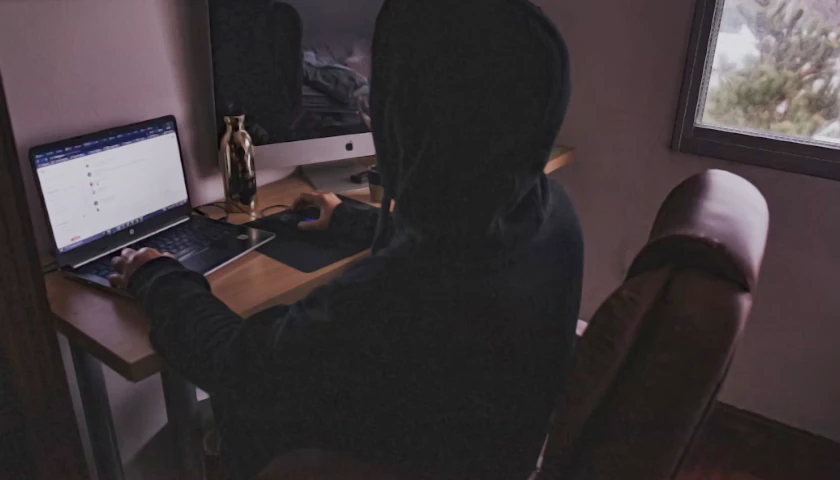 person on computer