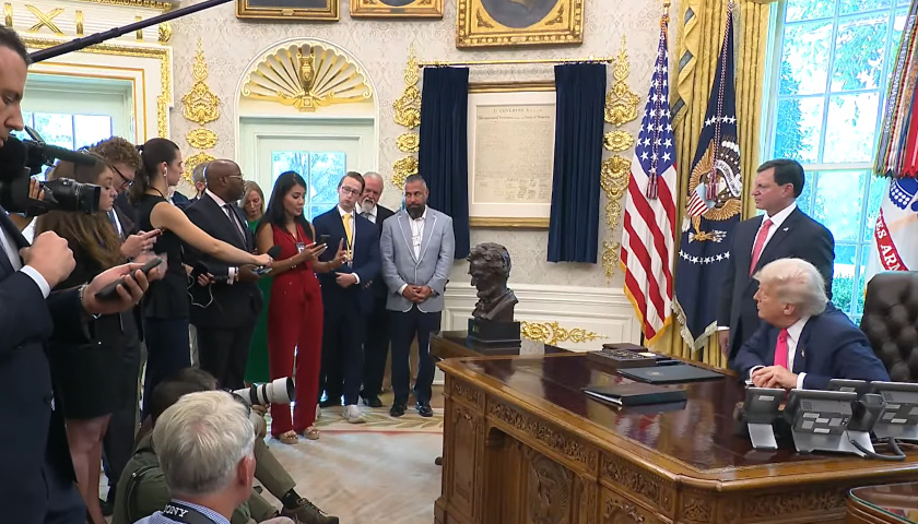 President Donald Trump takes questions from media