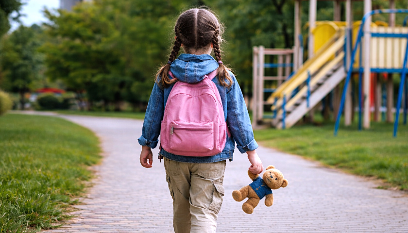 Little Girls Walking Past a Park