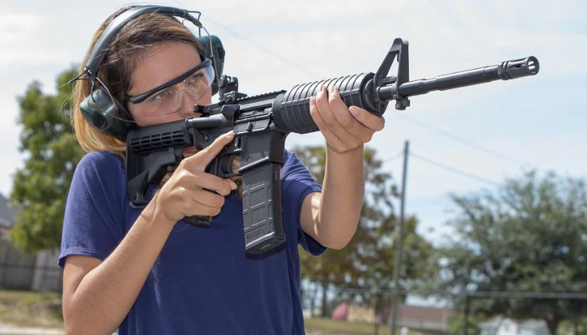 person shooting gun