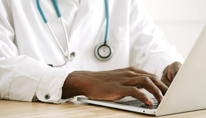 doctor and computer