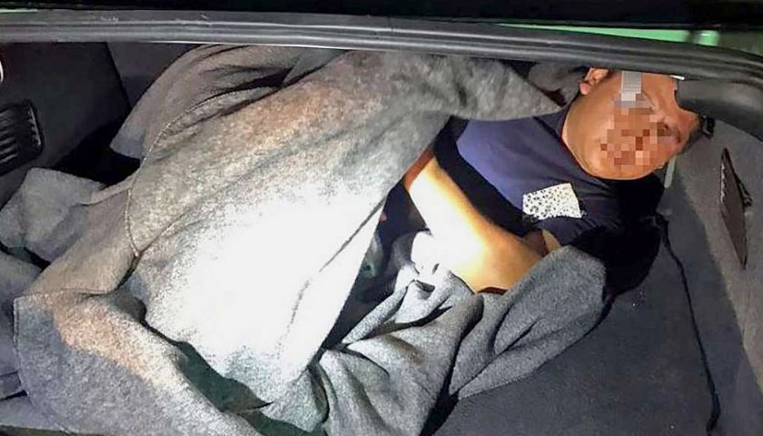 person in trunk